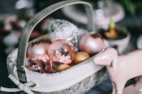 Kaboompics - Round dinner table decorated with easter motifs