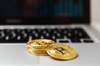 Kaboompics - Bitcoin Coins on Laptop With Market Chart