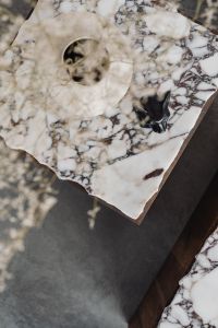 Kaboompics - Dried Branches in Ceramic Vase on a Sculptural Marble Side Table