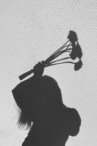 Kaboompics - Bouquet Shadow on Textured White Wall in Monochrome with Copy Space