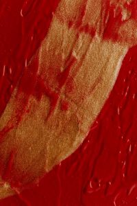 Kaboompics - Gold and Red Lipstick Texture