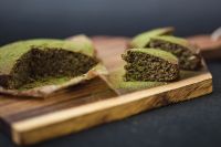 Kaboompics - Delicious homemade matcha cake on a wooden board