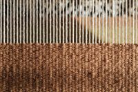 Kaboompics - Brown Woven Fabric with Vertical White Threads