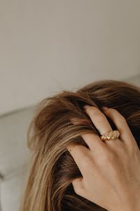 Kaboompics - Close-Up of Gold Rings in a Woman's Hair