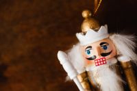 Kaboompics - White Nutcracker Ornament with Gold Crown