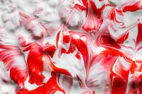 Kaboompics - Soft Red and White Paint Marbling Close-Up for Creative Product Layouts