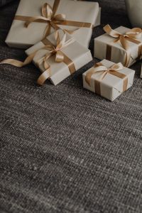 Kaboompics - Close-Up White Gift Boxes with Satin Bows