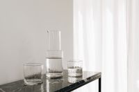 Kaboompics - Glass Carafe and Water Glasses Beside a Sheer Curtain