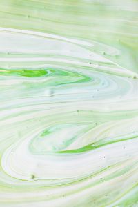 Kaboompics - Vertical Pale Green and White Paint Swirl with Copy Space for Pastel Backgrounds