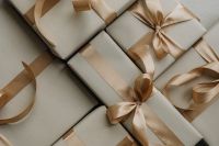 Kaboompics - Elegant White Gift Boxes with Satin Ribbon