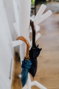 Kaboompics - Office hanger with umbrellas