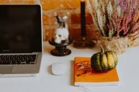 Kaboompics - Laptop With Pumpkin and Halloween Accessories
