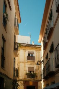 Kaboompics - Narrow Malaga Courtyard with Balconies