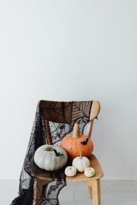 Kaboompics - Halloween Pumpkins and Bat Decorations on Chair