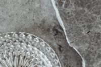 Kaboompics - Gray Marble Slab with Crystal Dish and Diagonal White Vein, Horizontal Background