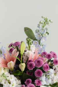 Kaboompics - Pastel Bouquet of Lilies, Chrysanthemums and Blue Flowers with Copy Space