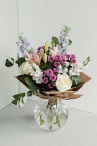 Kaboompics - Full Pastel Flower Bouquet Wrapped in Kraft Paper