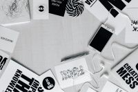Kaboompics - Top View of Typography Cards, Notebook, Phone and Earphones