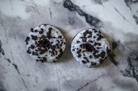 Kaboompics - Two Chocolate Donuts On Gray Marble