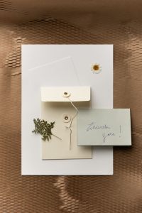 Kaboompics - Thank You Card with Envelope and Dried Flowers Flatlay