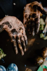 Kaboompics - Messy painted hands of a painting artist