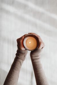 Kaboompics - Top View of a Lit Candle Held in Hands