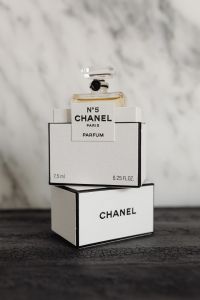 Kaboompics - Chanel No. 5 Perfume Bottle in Stacked Chanel Boxes