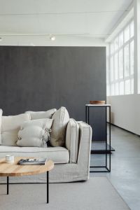 Kaboompics - Linen Sofa and Wooden Side Table in a Minimal Living Room
