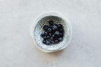 Kaboompics - Fresh Blueberries in Speckled Ceramic Bowl