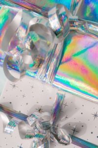 Kaboompics - Holographic Gift Wrap and Silver Ribbon Close Up
