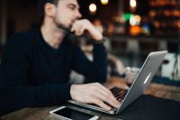Kaboompics - Man, laptop, mobile phone