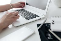 Kaboompics - Workplace with laptop on table at home