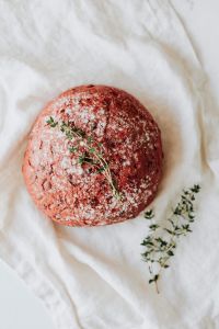 Kaboompics - Overhead Beetroot Bread Loaf with Fresh Thyme