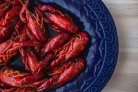 Kaboompics - Crayfish on a blue plate