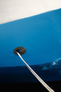 Kaboompics - Yellow Fishing Boat Bow With Red Flags
