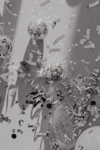 Kaboompics - New Year's Eve Flat Lay with Mirror Balls, Champagne and Confetti