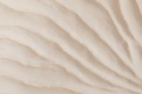 Kaboompics - Cream Abstract Background with Diagonal Sweeping Folds and Negative Space