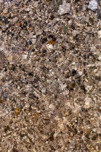 Kaboompics - Underwater Pebble Texture with Bright Wavy Light Reflections