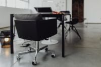 Kaboompics - Black Swivel Office Chair in a Minimalist Interior Design Studio