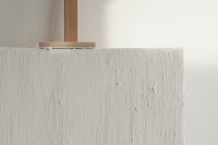 Kaboompics - Off-White Textured Paint Board on a Wooden Easel