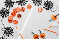 Kaboompics - Halloween Buttons and Spiderweb Decorations Flat Lay