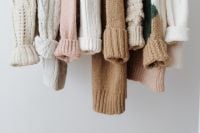 Kaboompics - Close-Up of Colorful Sweaters Hanging on Rack