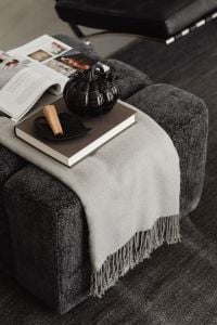 Kaboompics - Black Pumpkin Books and Blanket on Armchair