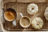 Kaboompics - Two Coffee Cups and White Pumpkins in a Wicker Tray