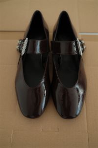 Kaboompics - Cherry Burgundy Mary Jane Heels on Cardboard
