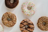 Kaboompics - Various donuts on white marble