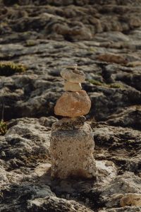 Kaboompics - Small Balanced Stone Stack on Seashore Rock
