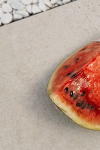 Kaboompics - Watermelon Slice on Neutral Stone Surface