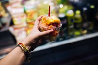 Kaboompics - Hand Holding a Fresh Fruit Salad Cup in Barcelona