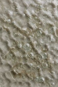Kaboompics - Macro Bubbled Glass Texture Background with Irregular Clear Inclusions